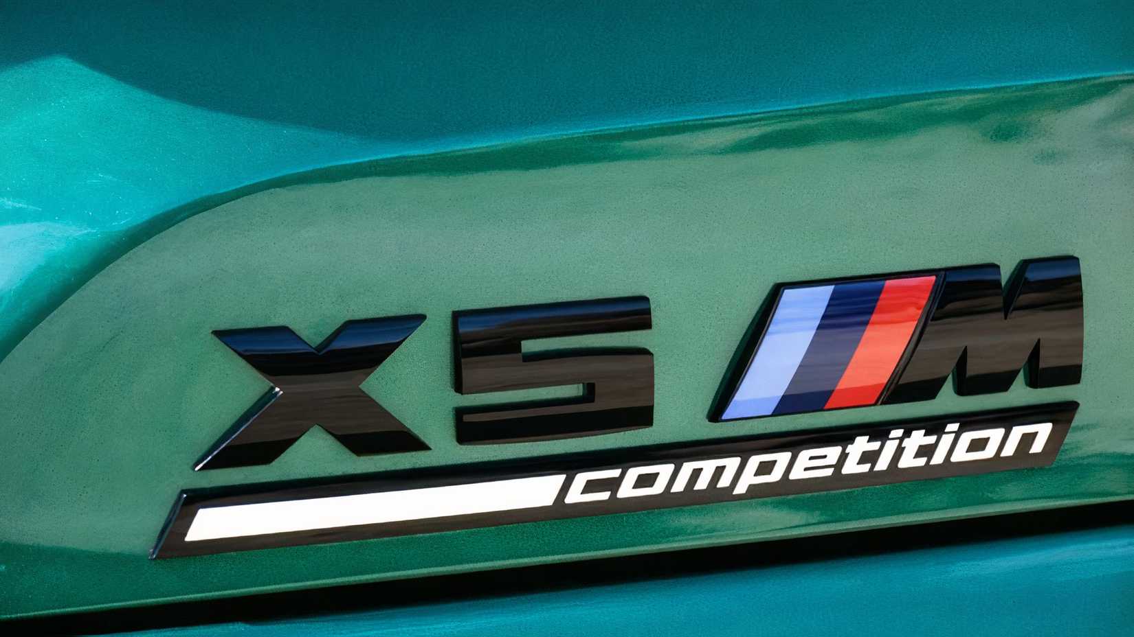 Close-up shot of 2026 BMW X5 M Competition badge