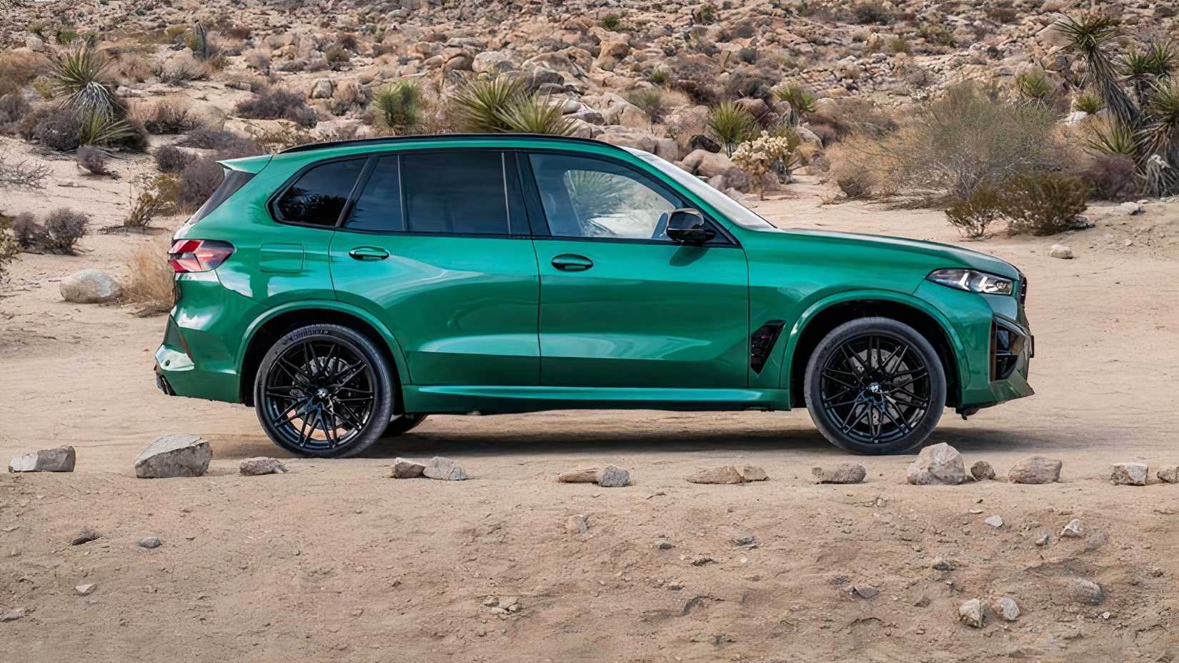 Profile shot of 2026 BMW X5 M Competition parked off-road