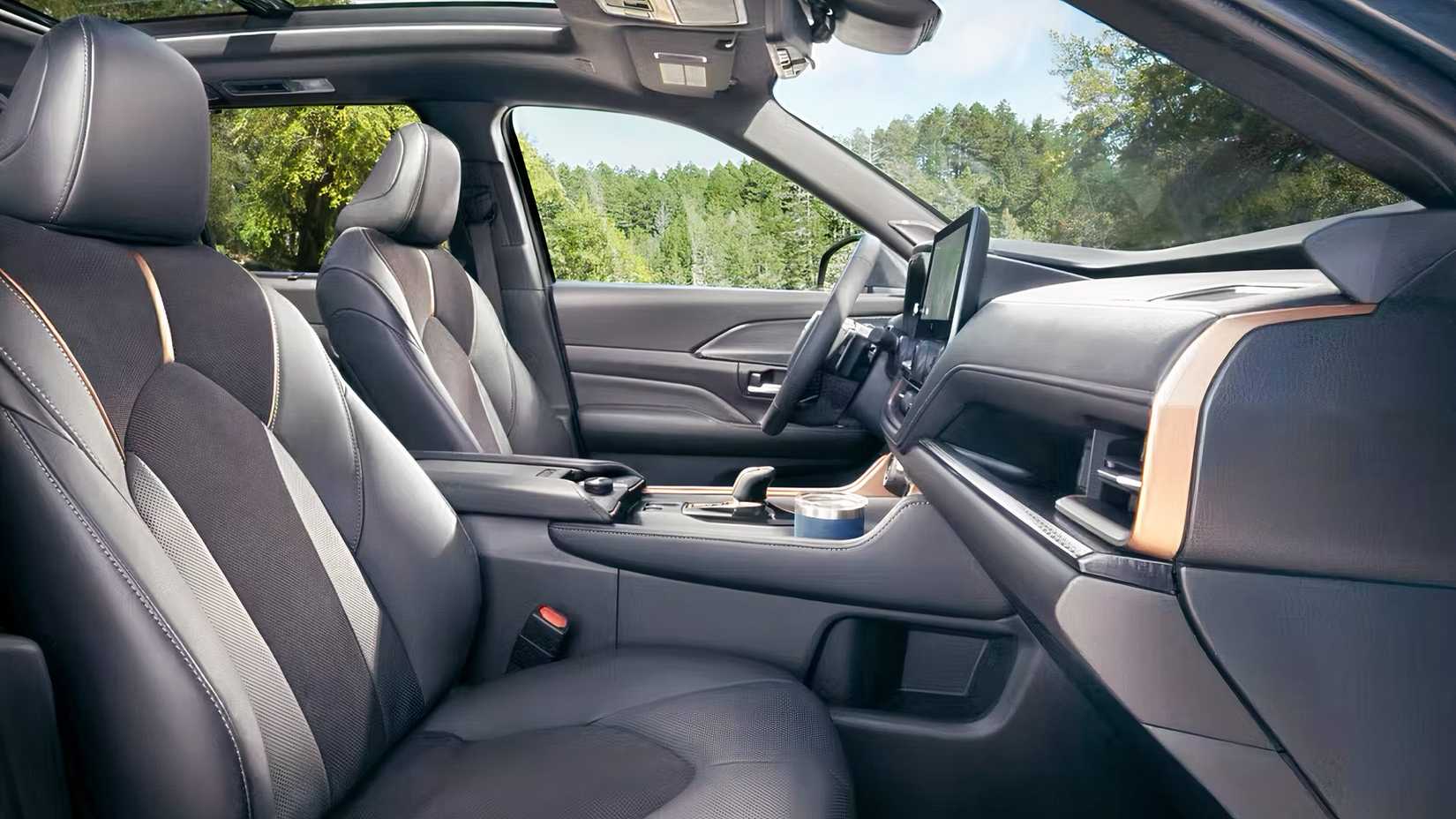 2026 Toyota Grand Highlander Hybrid interior showing front seats