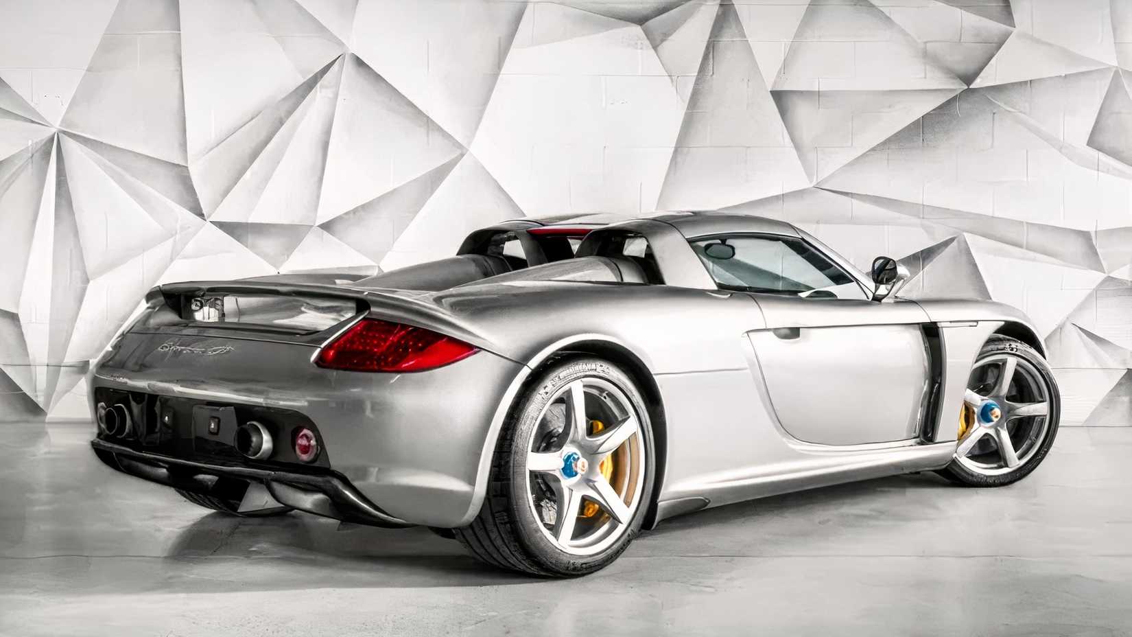 2005 Porsche Carrera GT in silver rear 3/4