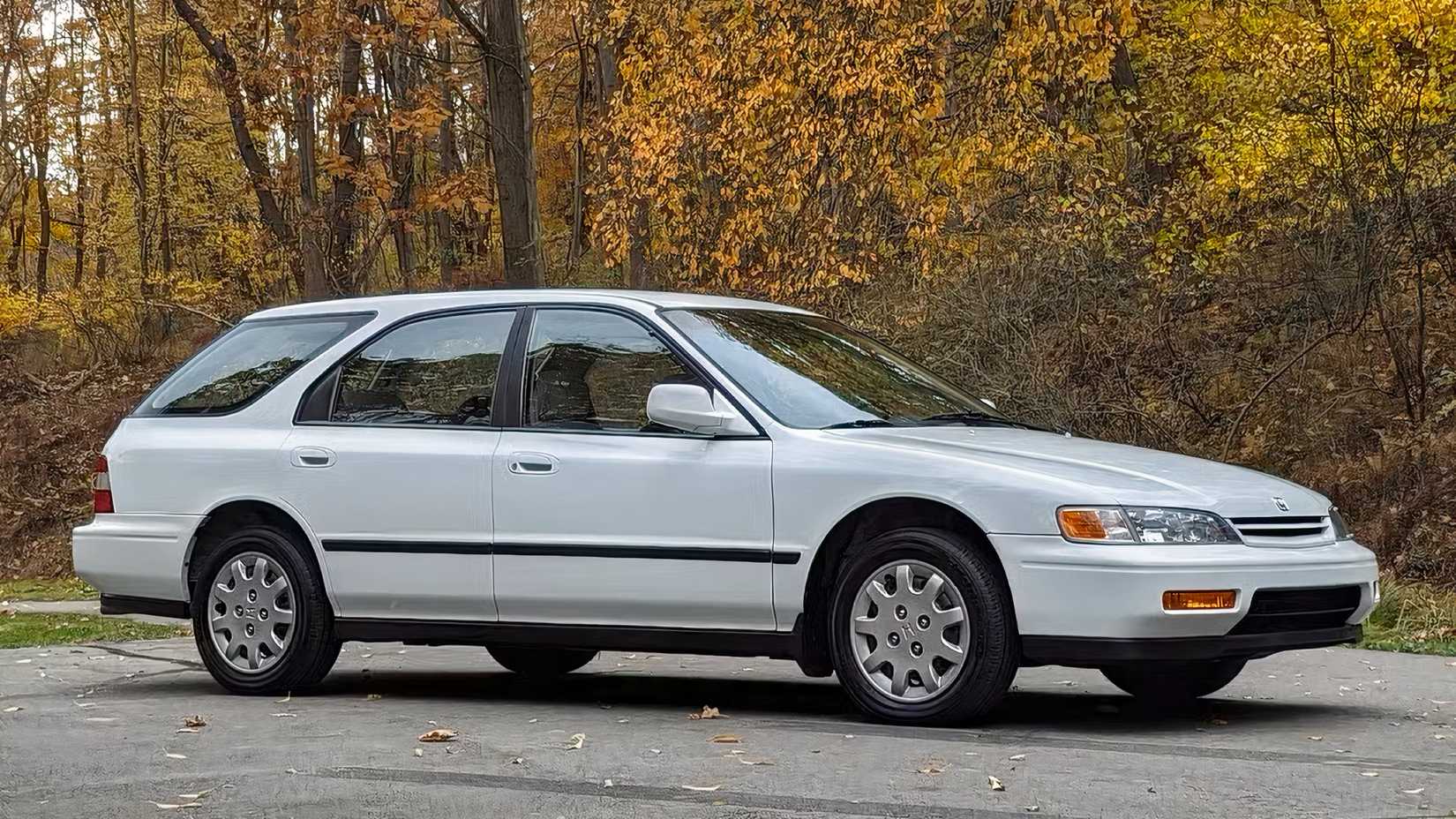 Front 3/4 shot of Honda Accord Wagon parked in lot