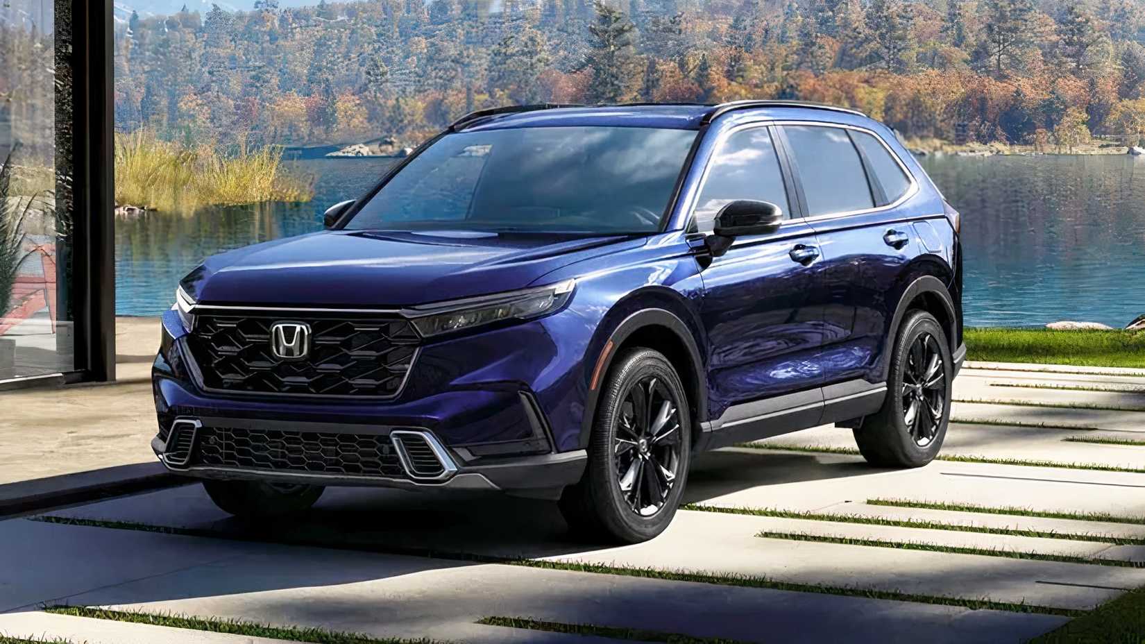 2026 Honda CR-V Sport Touring Hybrid front 3/4 parked in front of house