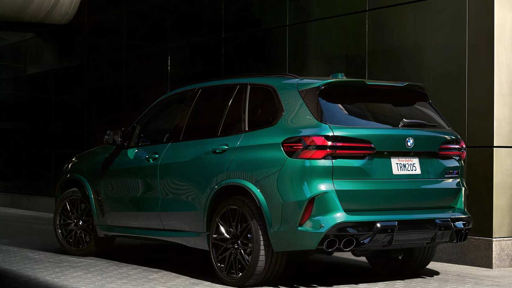 Rear 3/4 shot of 2026 BMW X5 M parked