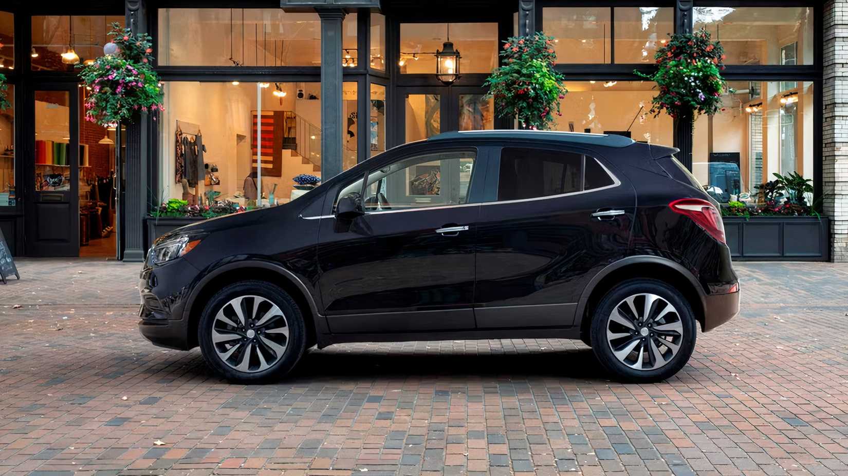 Profile shot of 2021 Buick Encore in black parked