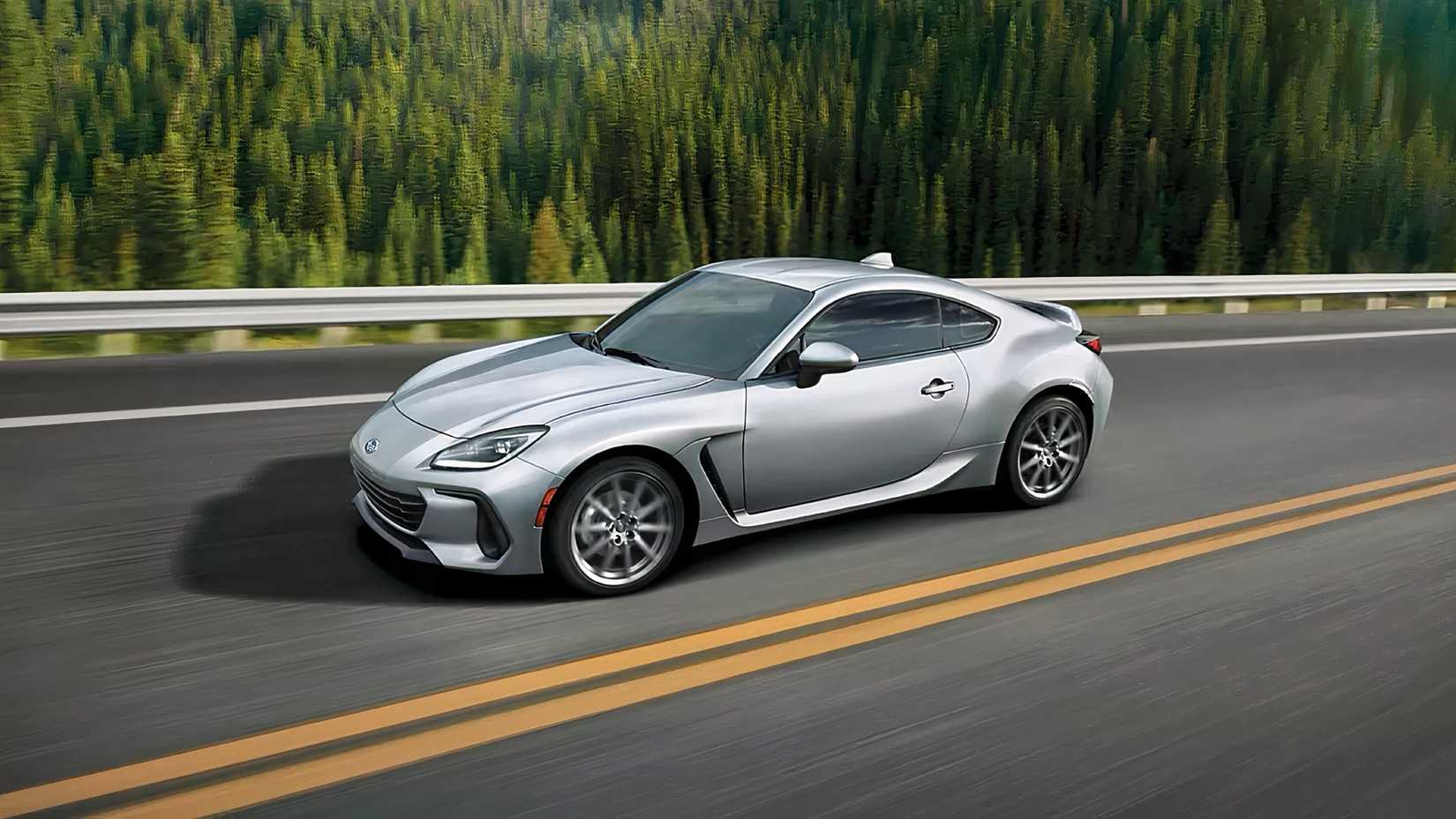 Front 3/4 action shot of 2026 Subaru BRZ driving on road
