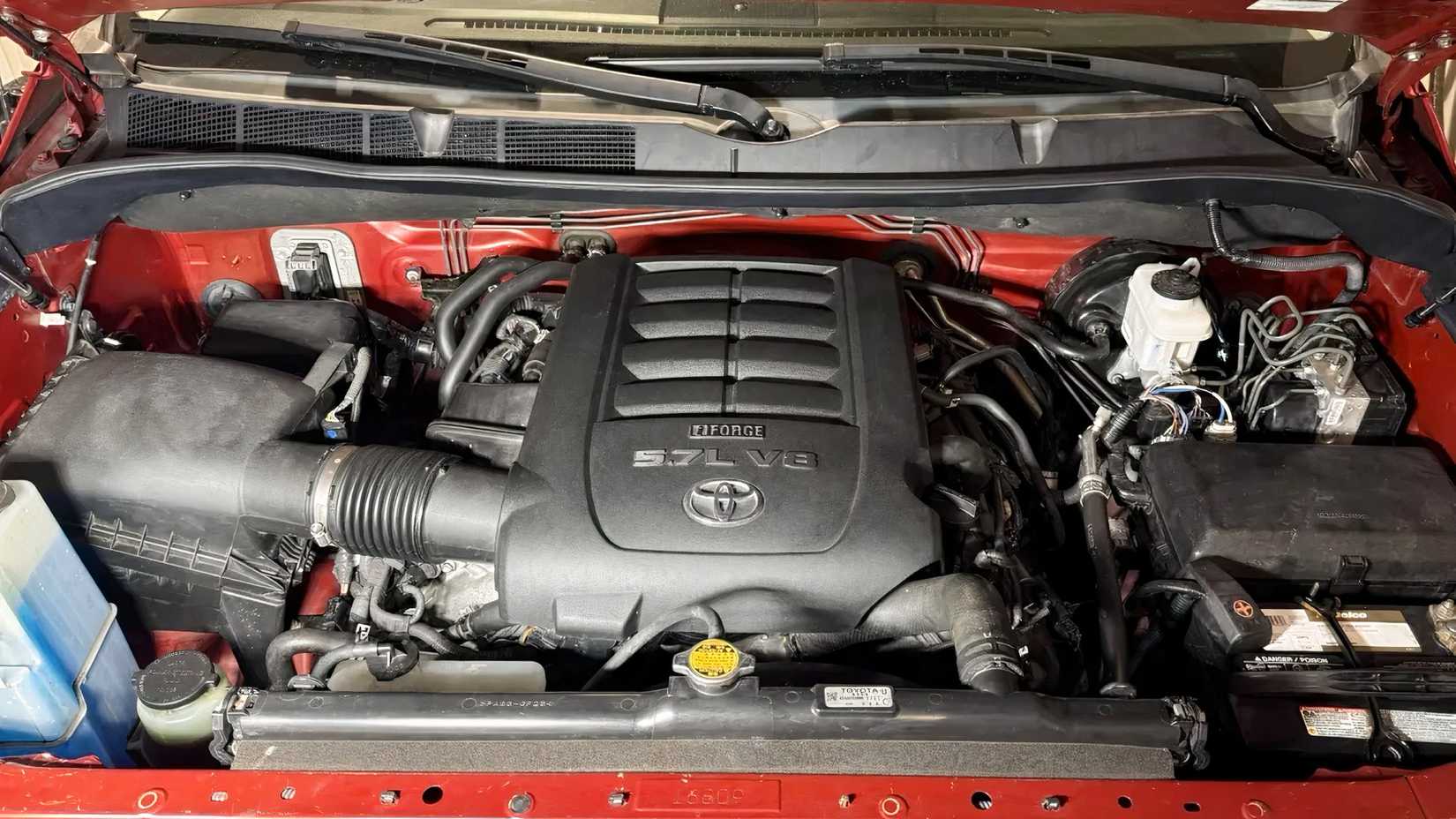 2014 Toyota Tundra engine bay showing 3UR-FE V8