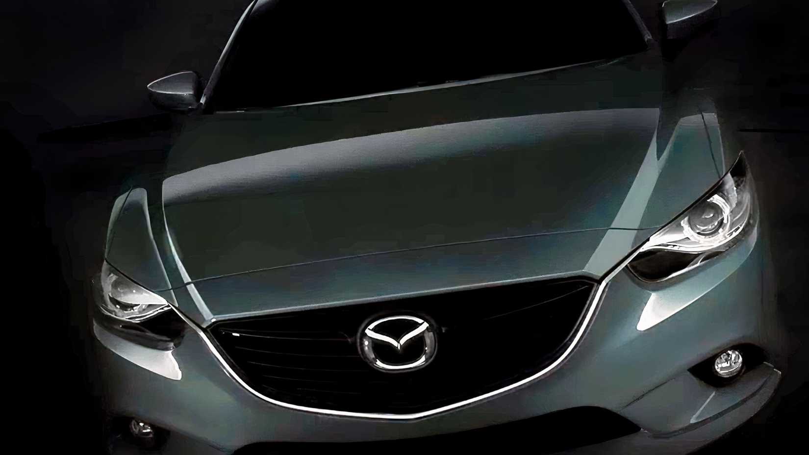 Grande plano frontal dos faróis do Mazda3