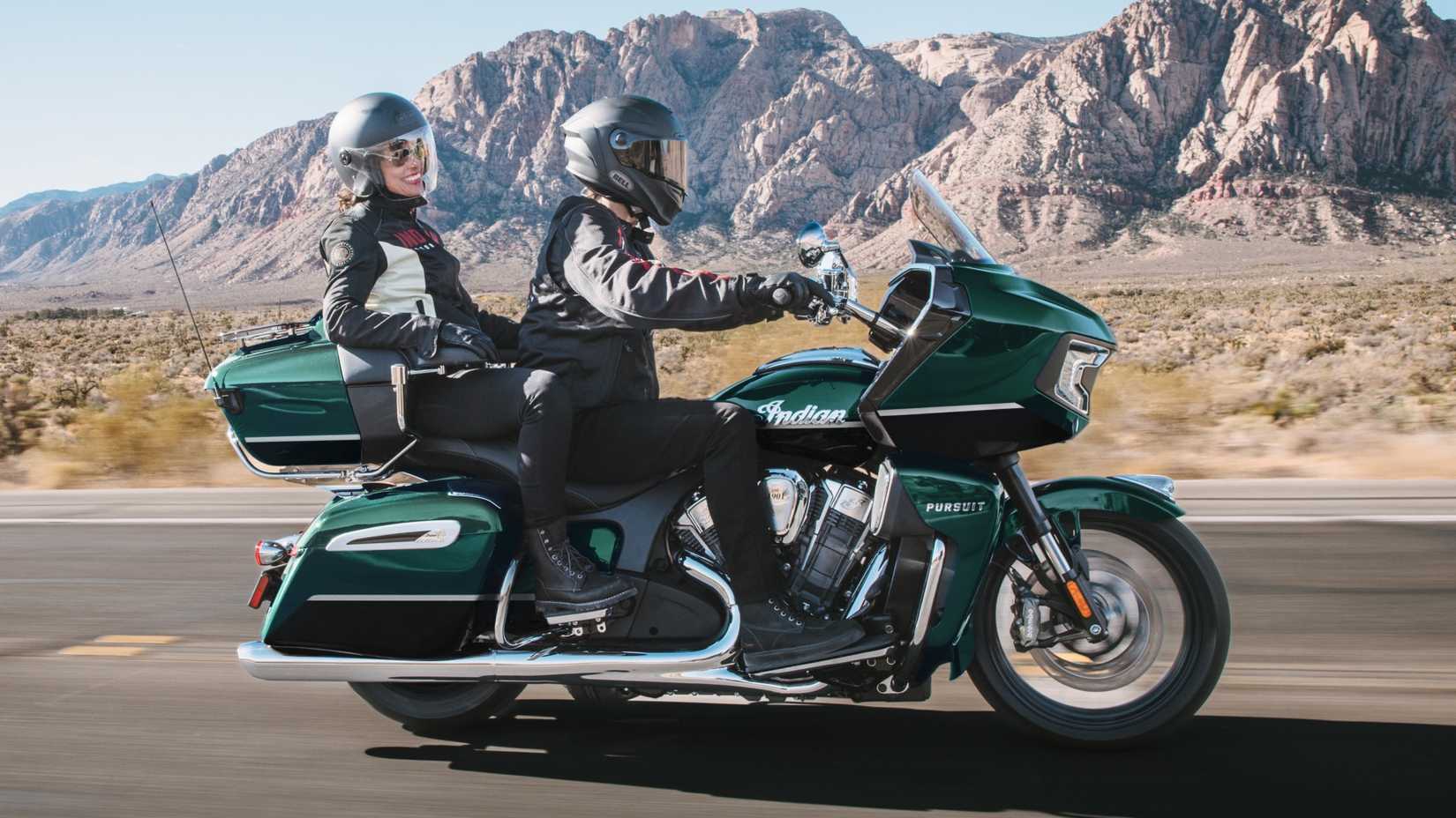 2026 Indian Pursuit touring comfortable on a cross country trip, side profile rolling shot