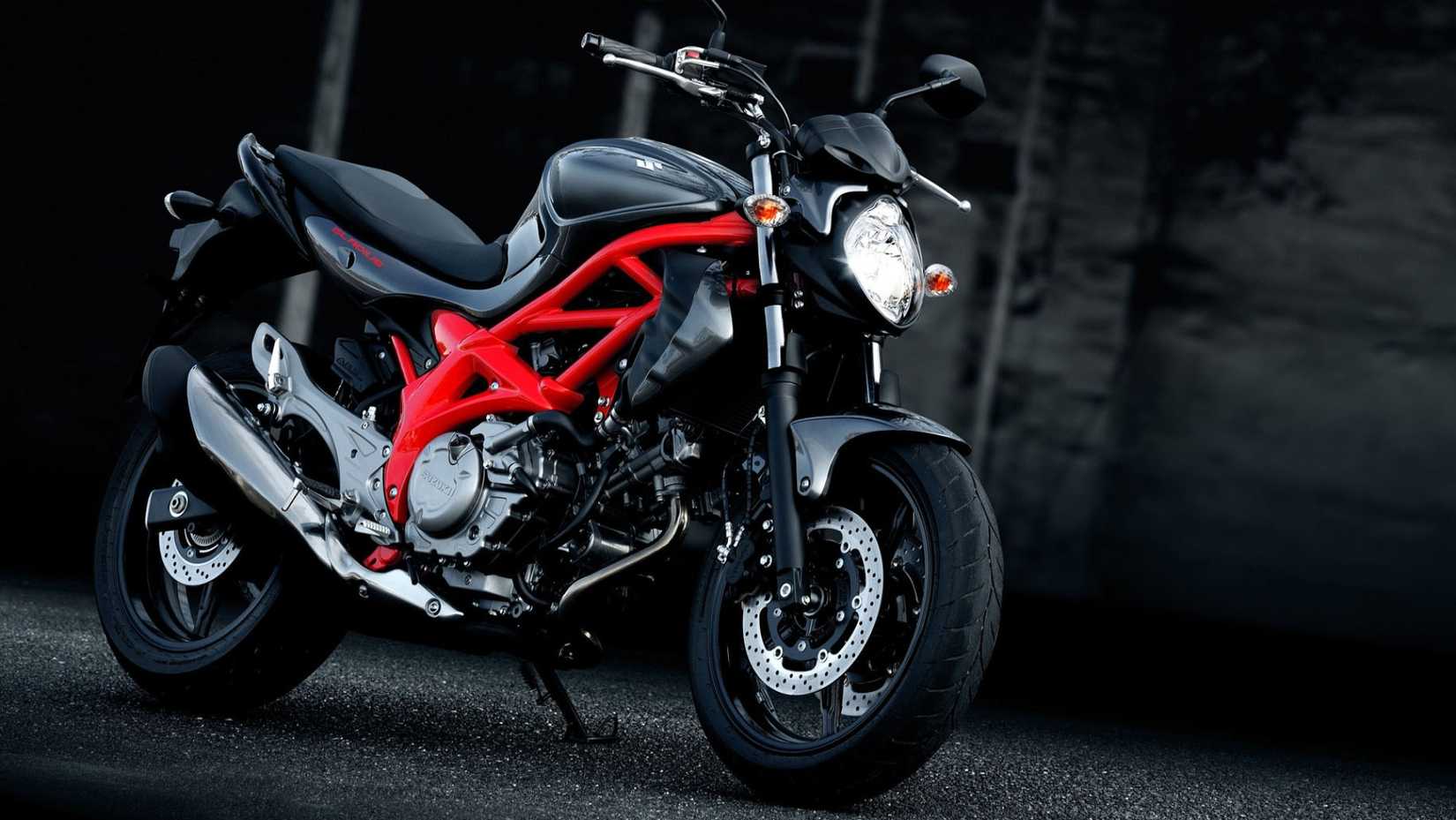 2015 Suzuki SFV650 Gladius parked in a garage front third quarter cinematic shot