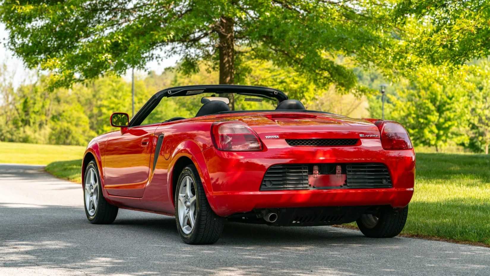 Rear 3/4 shot of a 2002 Toyota MR2 parked on the road