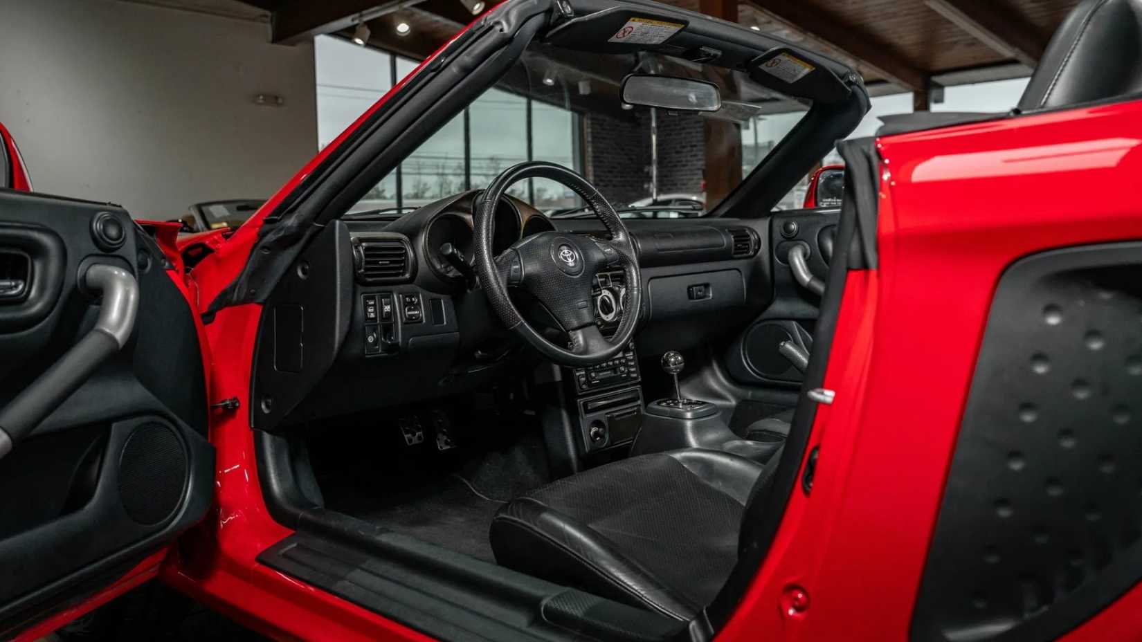 Interior shot of a 2002 Toyota MR2 showing front cabin