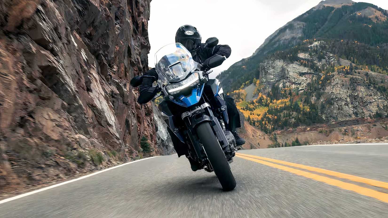 Triumph Tiger 1200 GT Pro riding on mountain roads