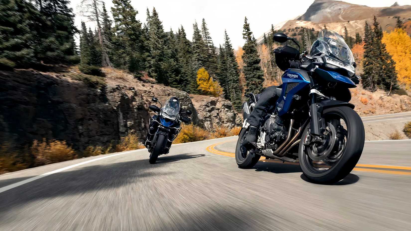 Triumph Tiger 1200 GT Pro andando em estradas sinuosas