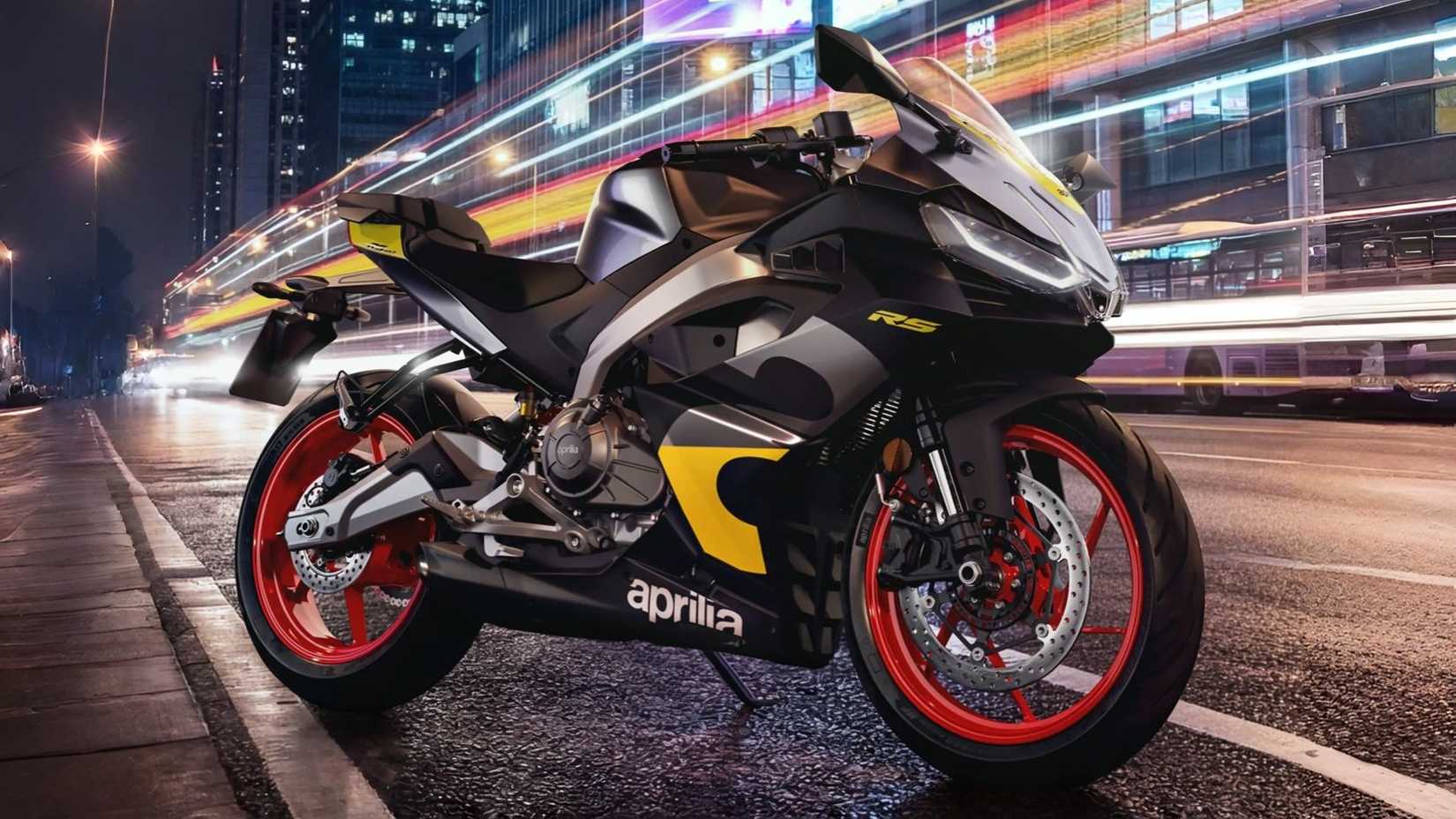 2026 Aprilia RS 457 nova tonalidade com detalhes em amarelo estacionada, vista frontal do terceiro quarto