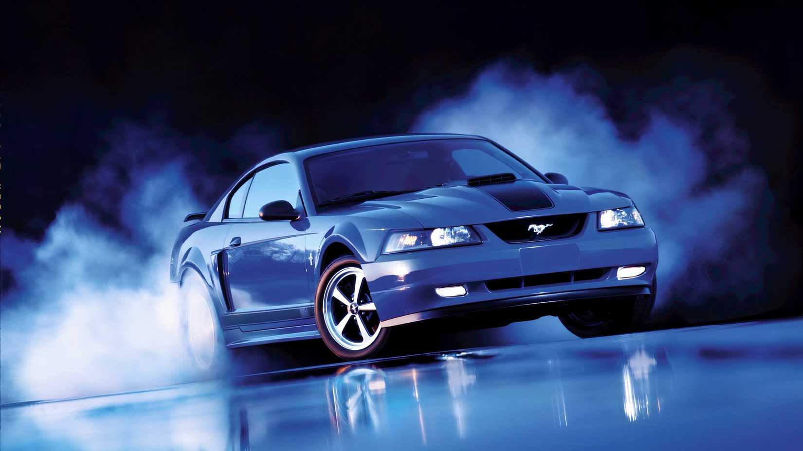 Blue 2004 Ford Mustang Mach 1 Posed With Smoke Scene