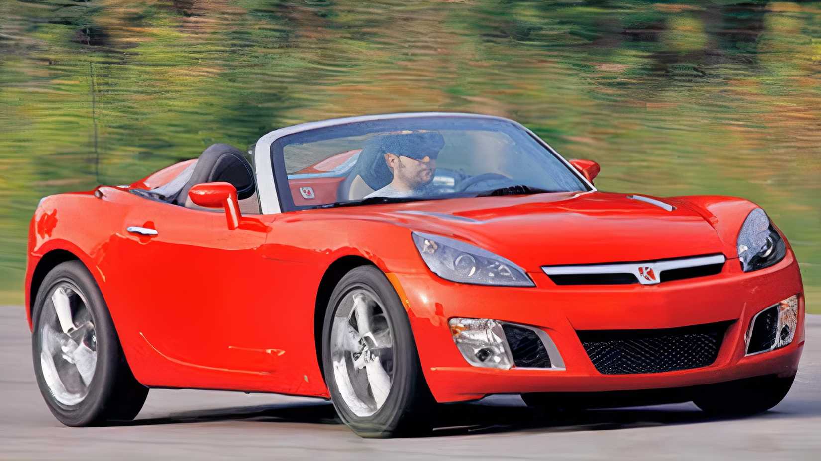 2007 Saturn Sky Red Line front 3/4 shot driving on the road