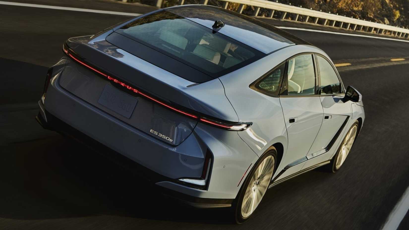 2026 Lexus ES 350h rear 3/4 shot driving down the road