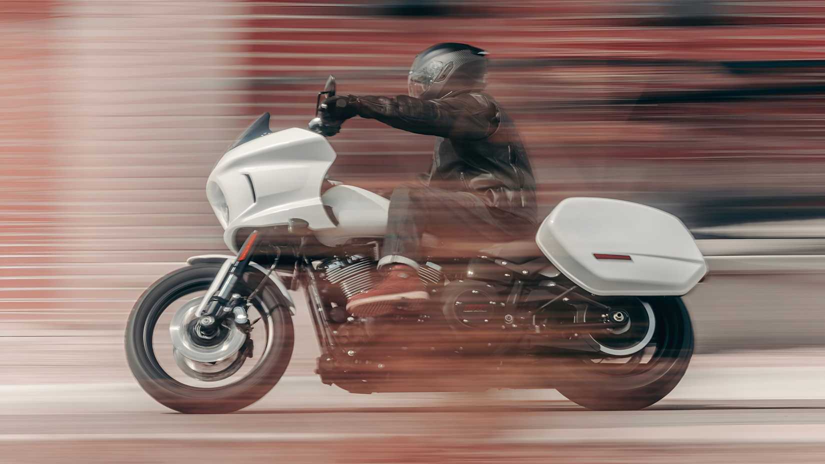 2026 Harley-Davidson Low Rider ST accelerating hard side profile view