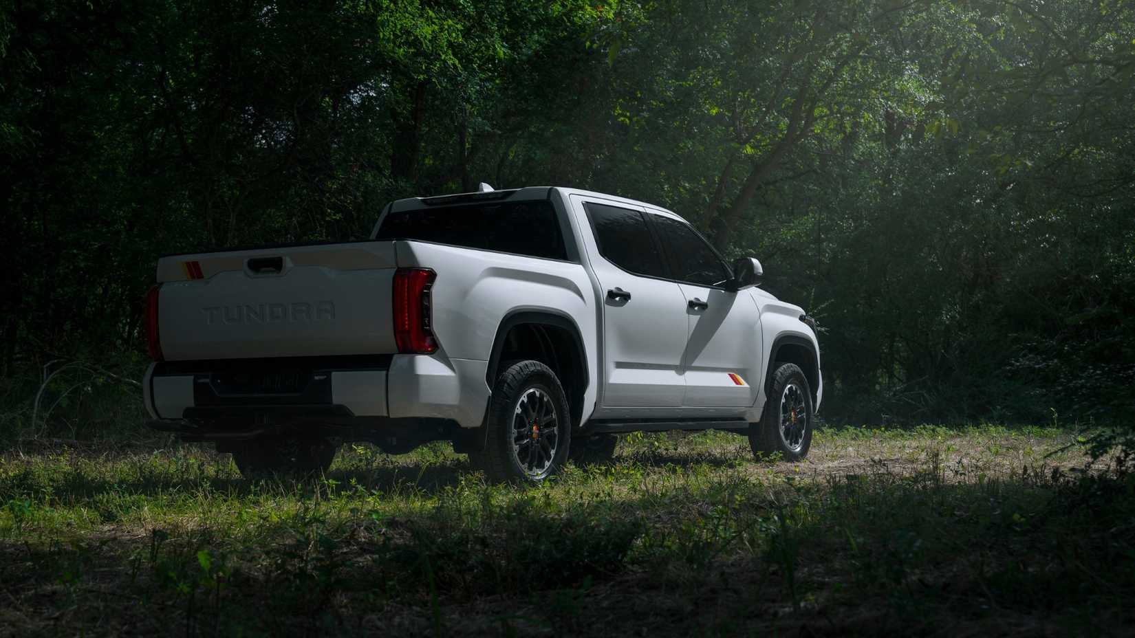 2026 Toyota Tundra TRD rear 3/4 shot parked in grass