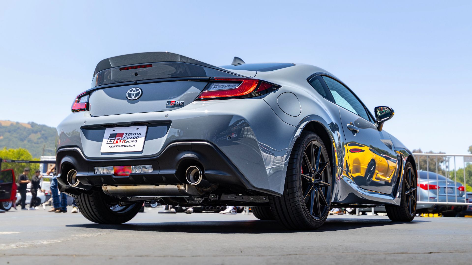 Rear 3/4 stationary image of the 2027 Toyota GR86 at FuelFest in the Bay Area