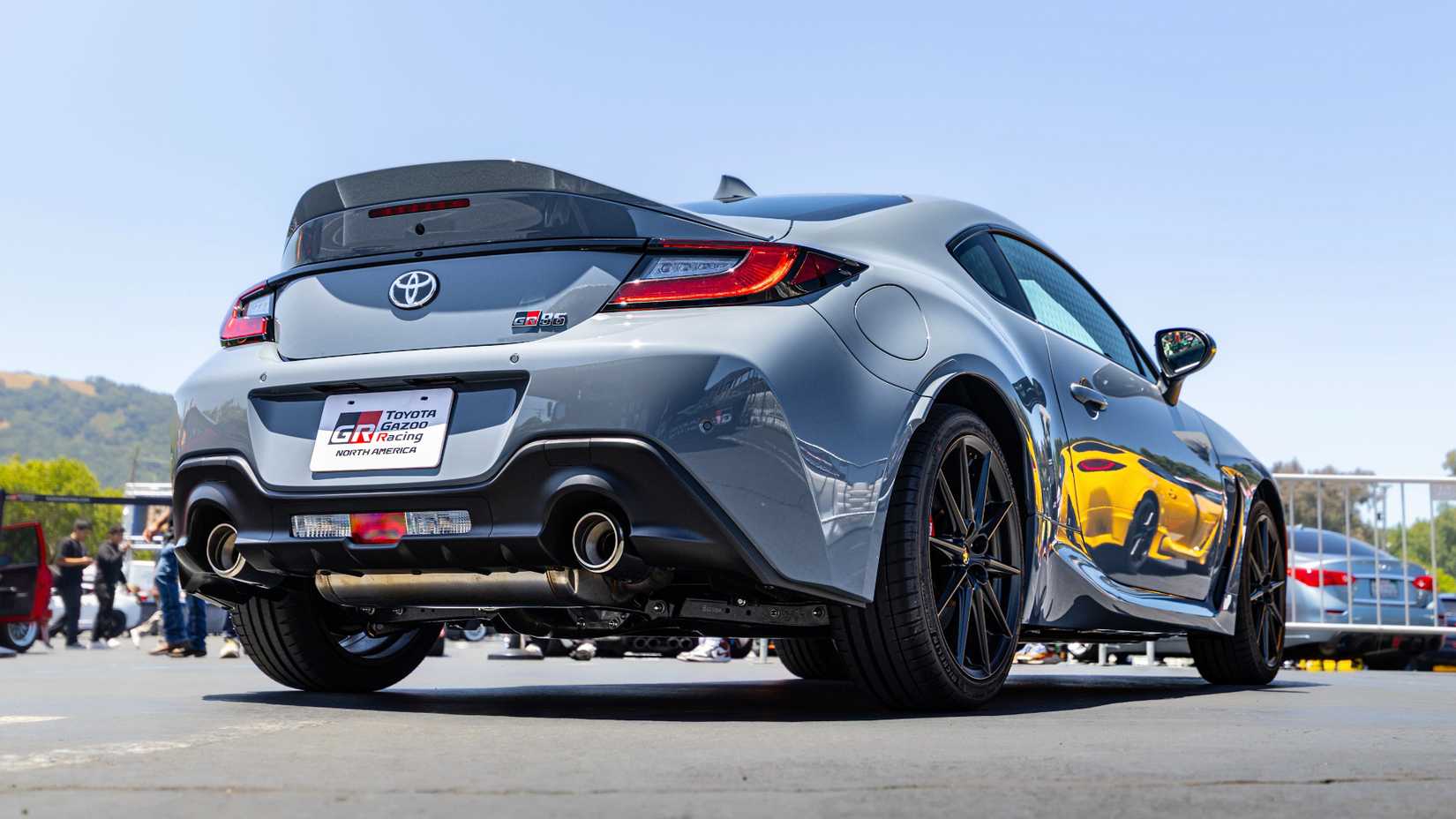 Rear 3/4 stationary image of the 2027 Toyota GR86 at FuelFest in the Bay Area
