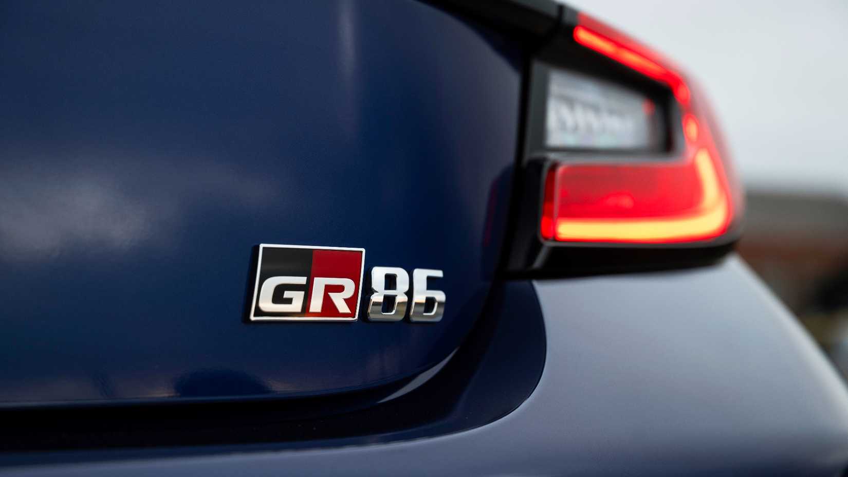 Static image of the rear badge of the 2027 Toyota GR86 in blue