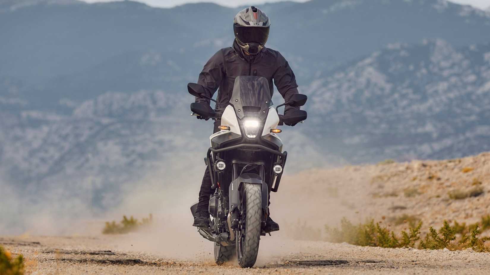 2026 Honda NX500 off-roading front fascia panned-out view