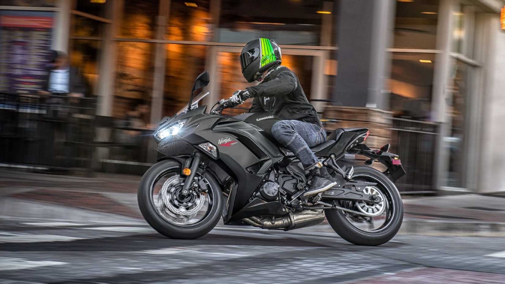 Black 2026 Kawasaki Ninja 650 Riding In the City Street