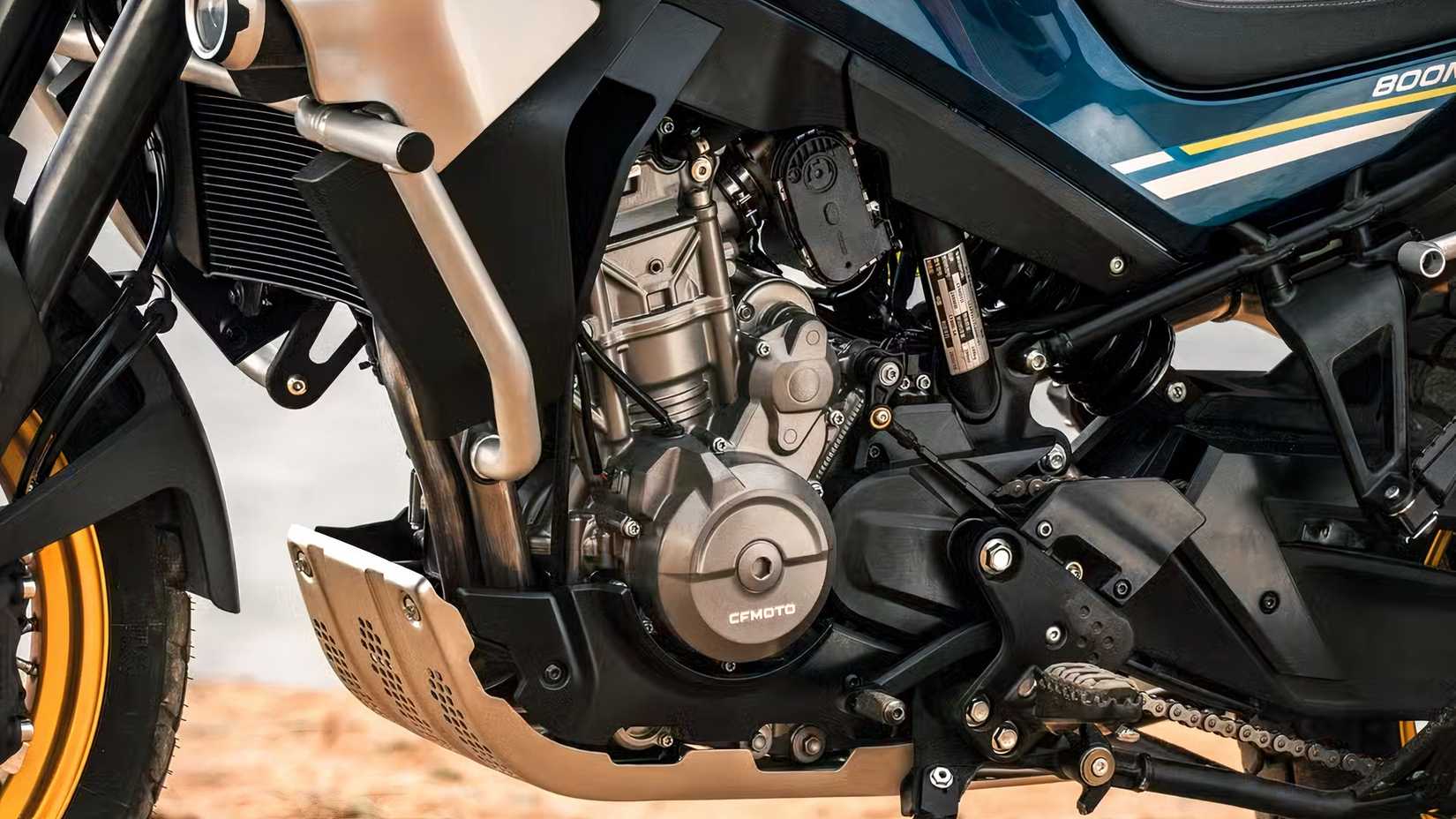 Close-up detail shot of the CFMoto Ibex 800 E engine