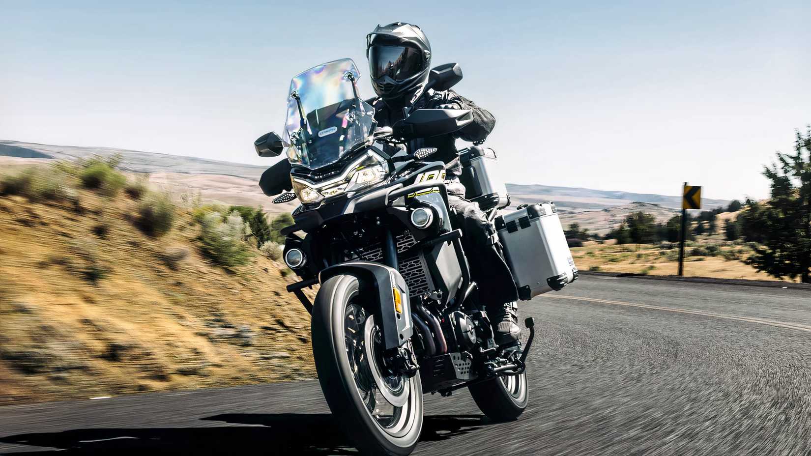 CFMoto Ibex 800 E driving on winding roads