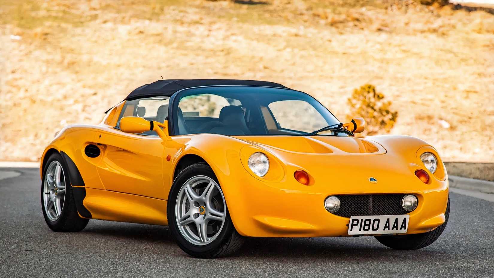 1996 Lotus Elise S1 in yellow front 3/4