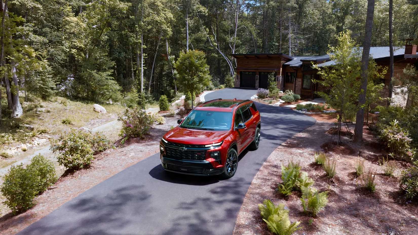 2026 Chevrolet Traverse in red front 3/4