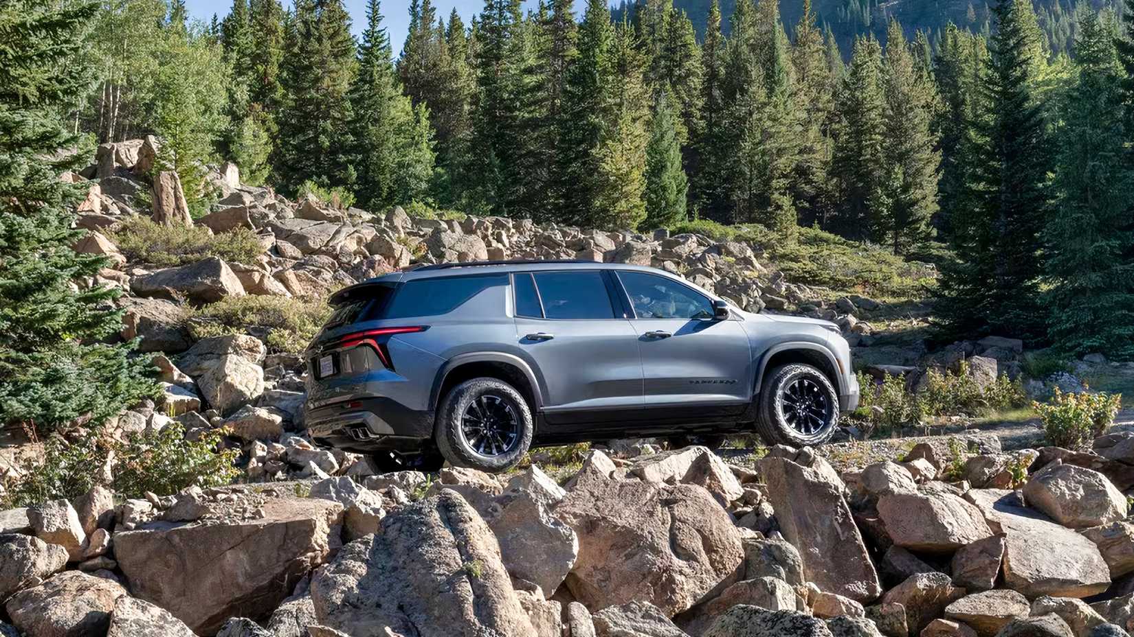 Rear 3/4 shot of 2026 Chevrolet Traverse parked off-road