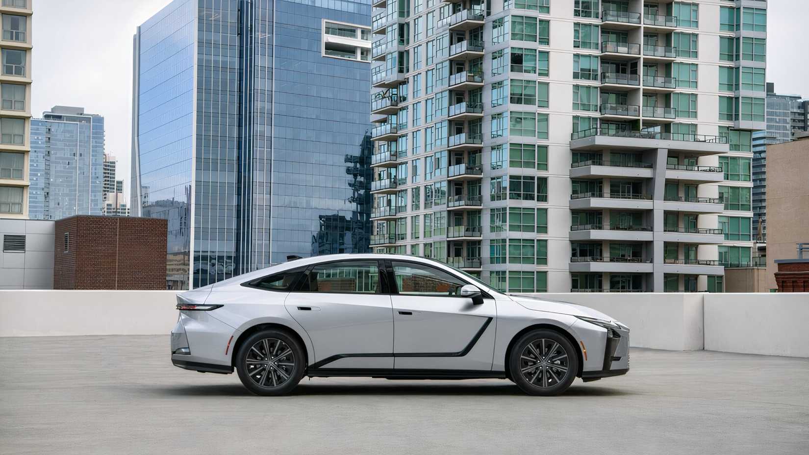 Profile shot of 2026 Lexus ES 350h parked