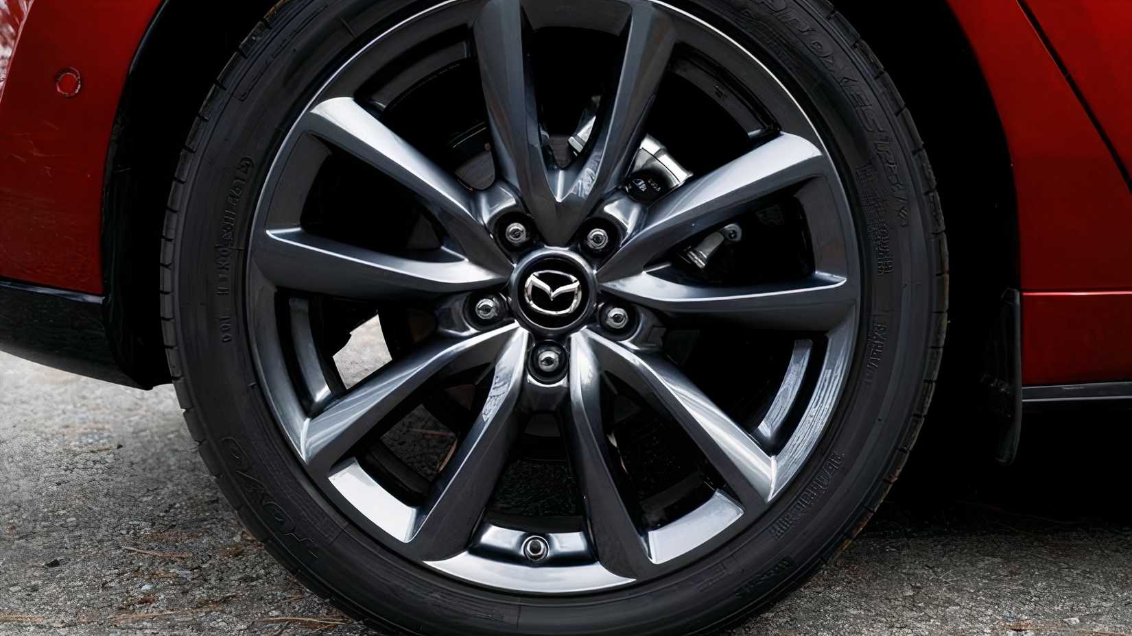 Close-up shot of 2026 Mazda 3 wheel
