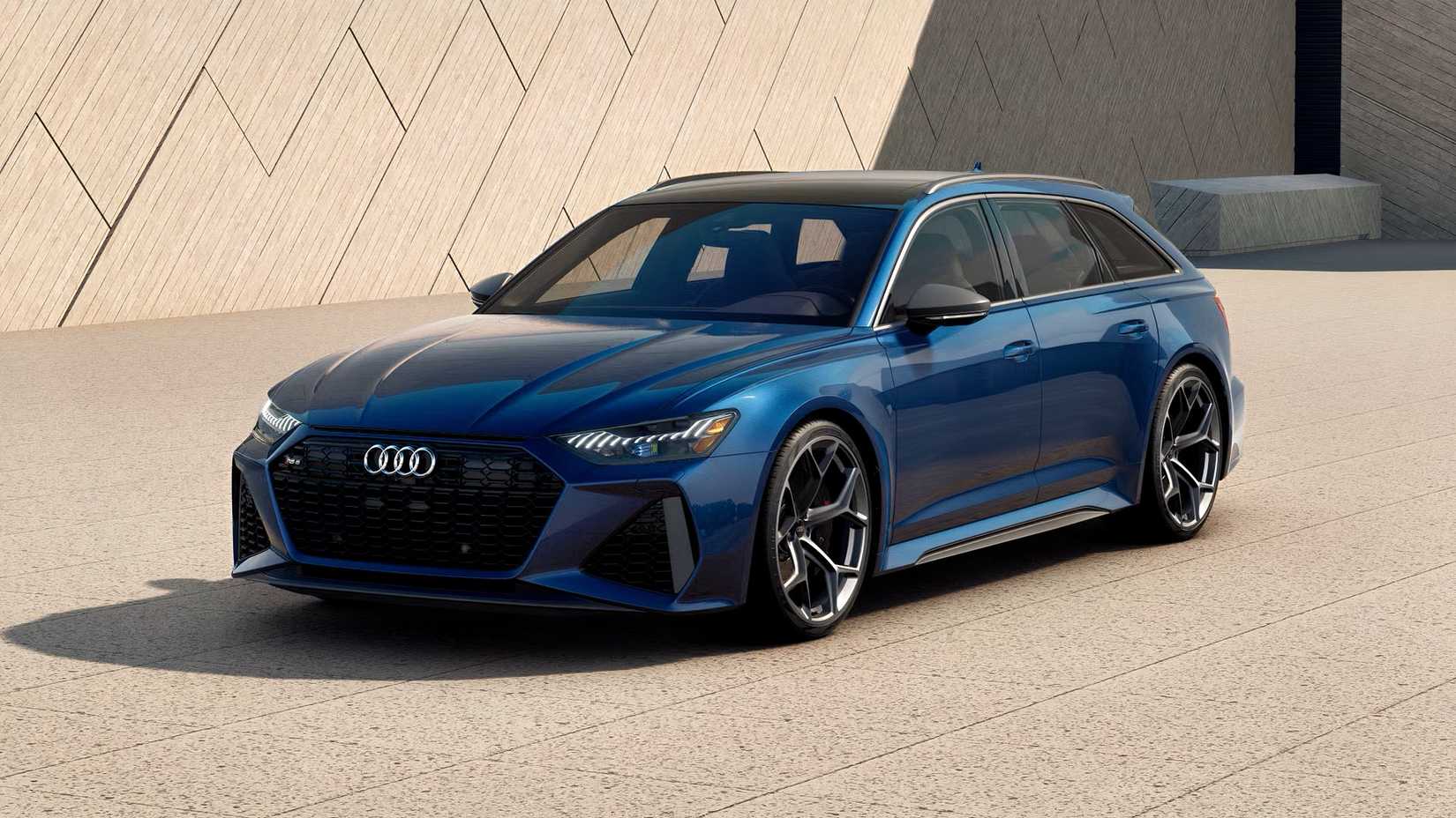 Front 3/4 shot of 2026 Audi RS6 Avant Performance in blue parked