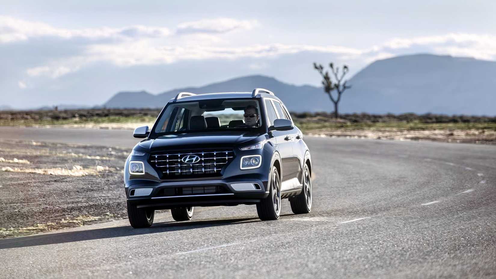 2025 Hyundai Venue front shot driving on the road