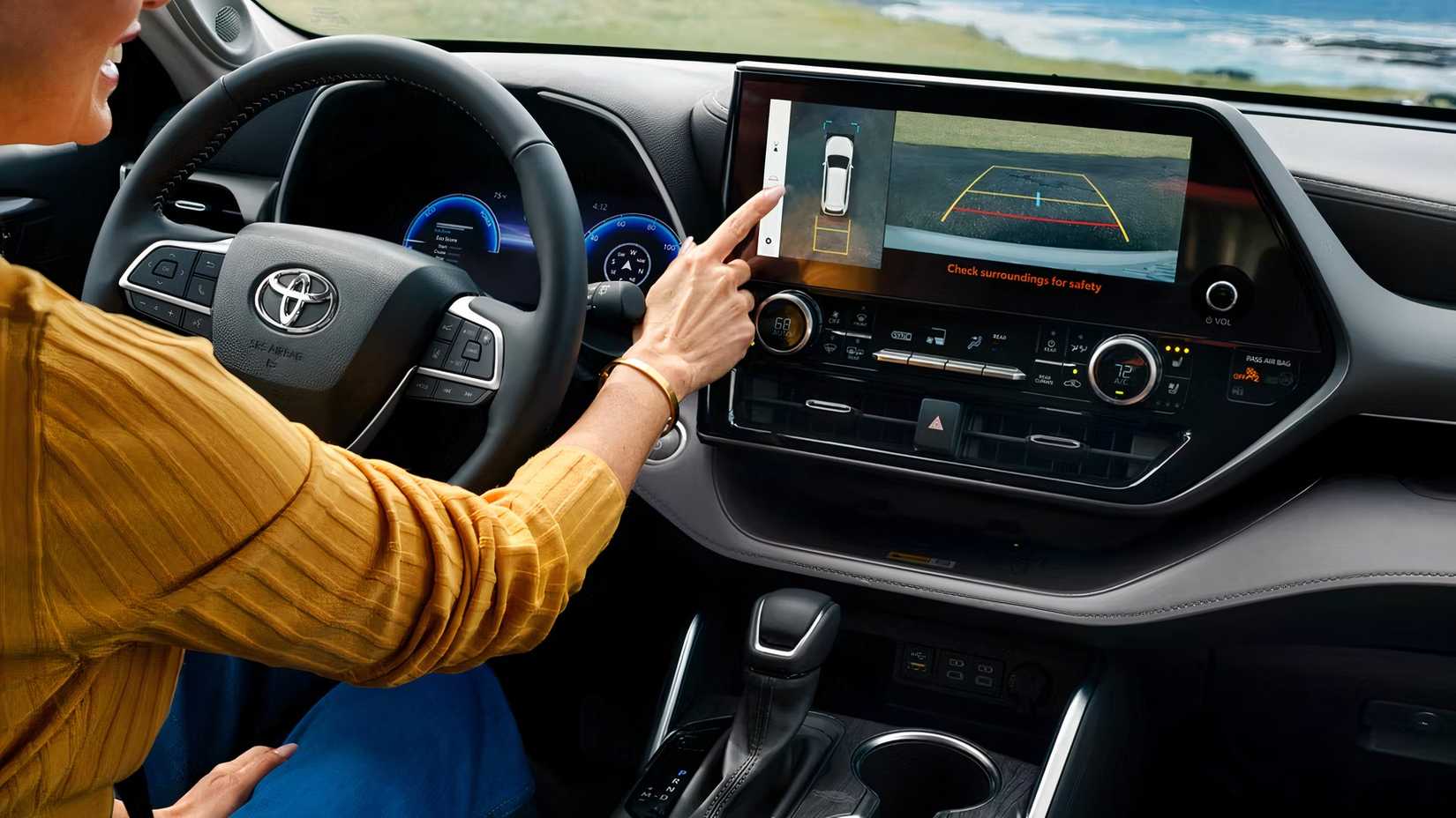 2026 Toyota Highlander Hybrid interior shot showing the dashboard