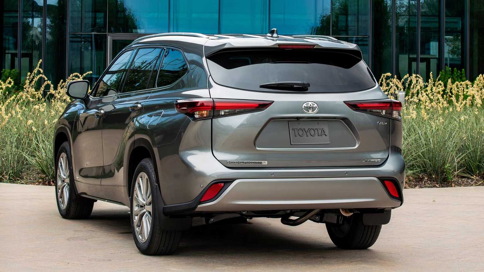 2026 Toyota Highlander Hybrid Rear 3/4 Shot Parked in the Driveway