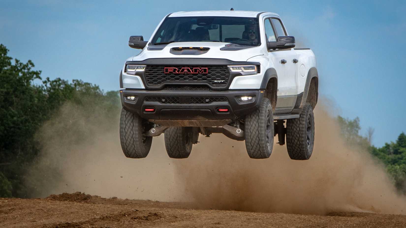 Front action shot of 2027 Ram 1500 TRX jumping off-road