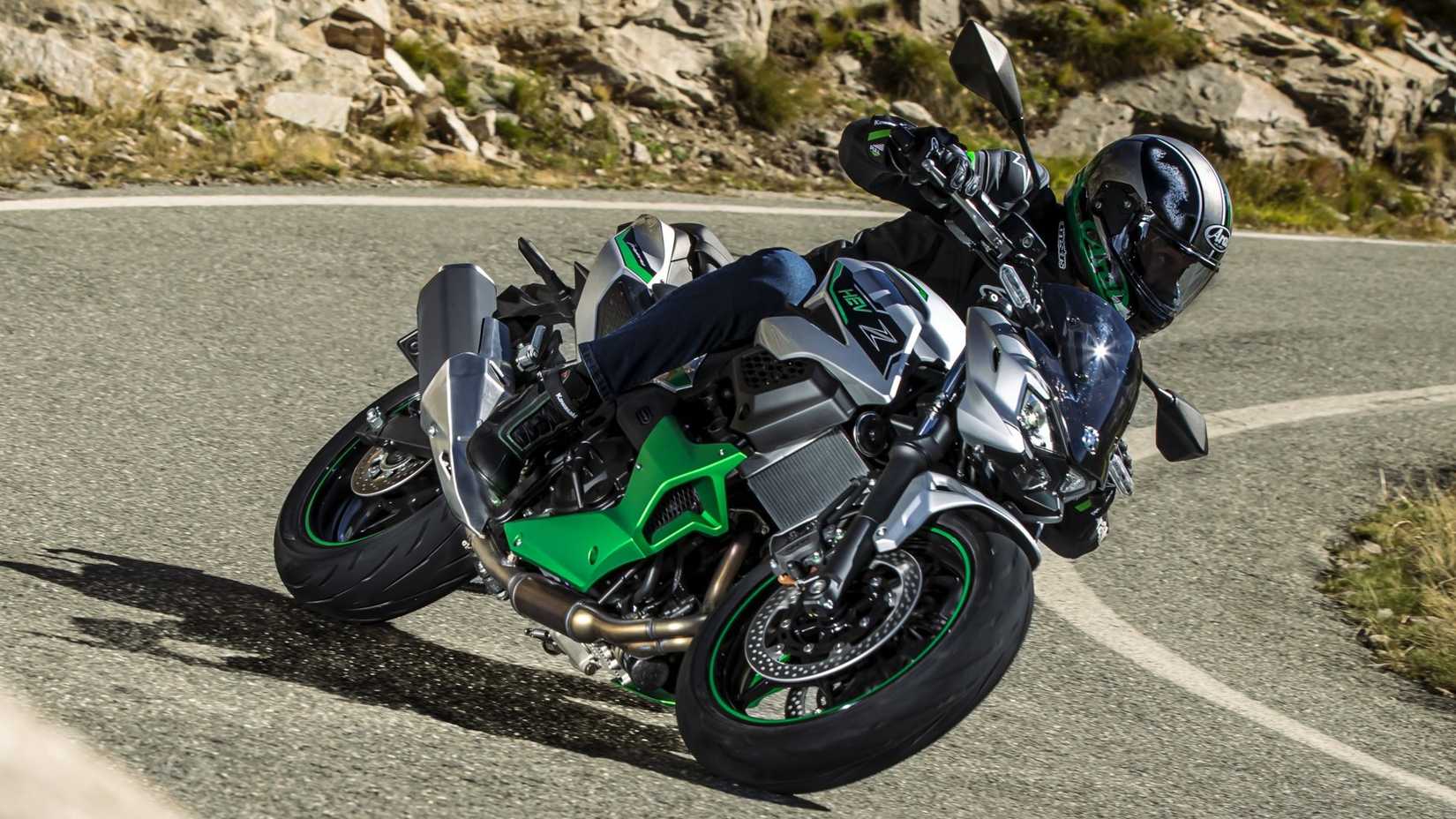 Kawasaki Z7 Hybrid third quarter cinematic shot in front of a winding mountain road