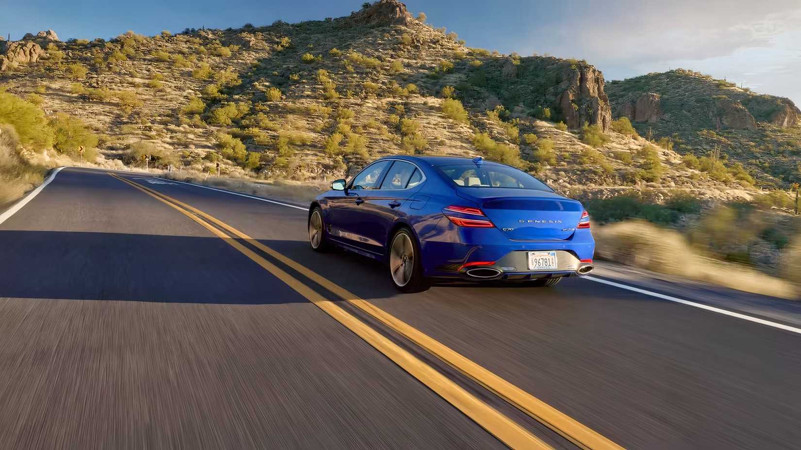 2026 Genesis G70 in blue rear 3/4 action