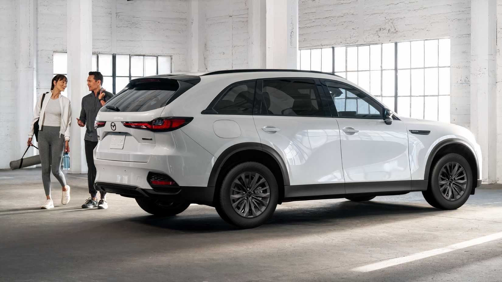 Rear 3/4 shot of 2026 Mazda CX-70 PHEV parked in garage