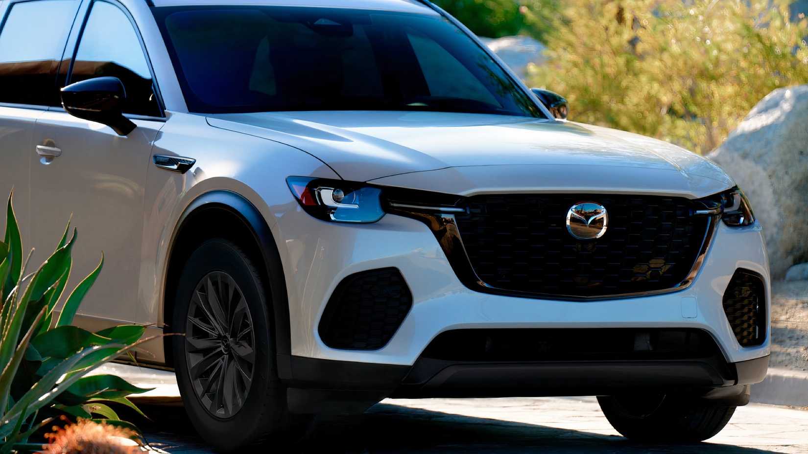 Close-up front 3/4 shot of 2026 Mazda CX-70 PHEV parked