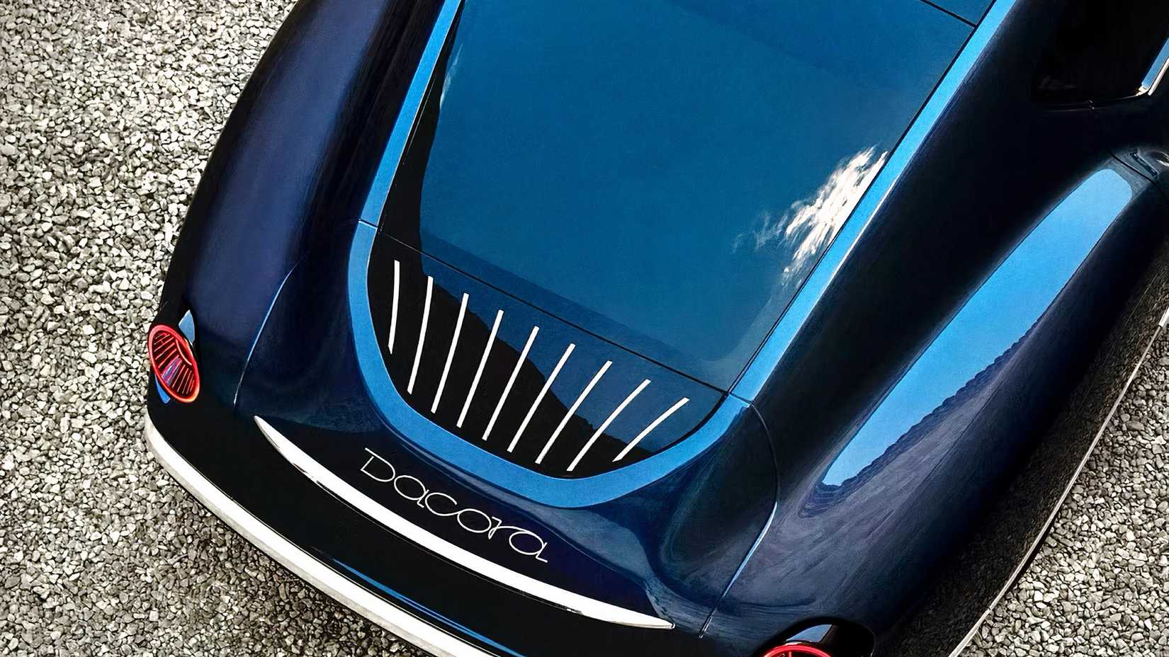 Rear shot of Dacora luxury car in black parked