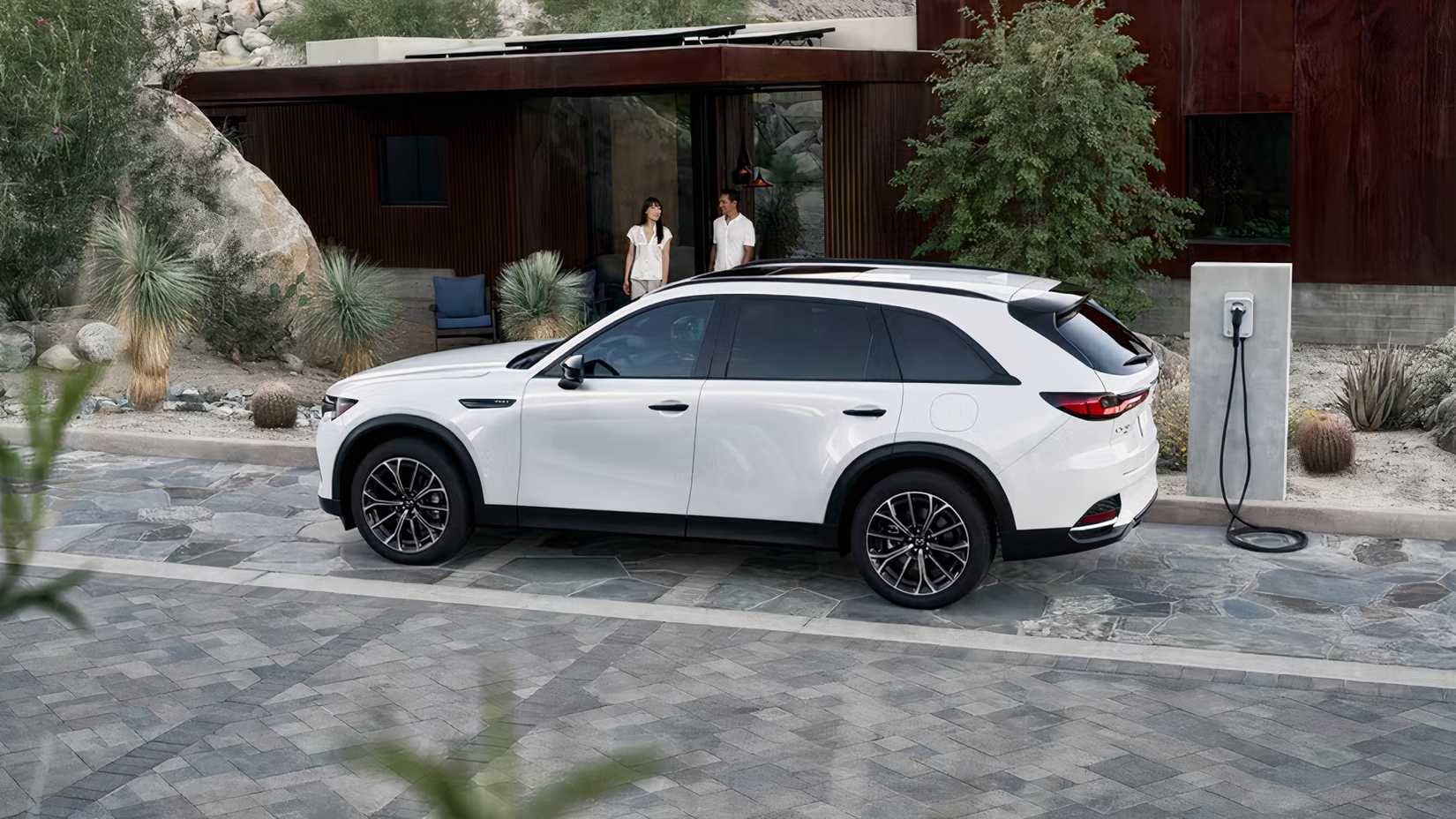 Rear 3/4 shot of 2026 Mazda CX-70 PHEV parked