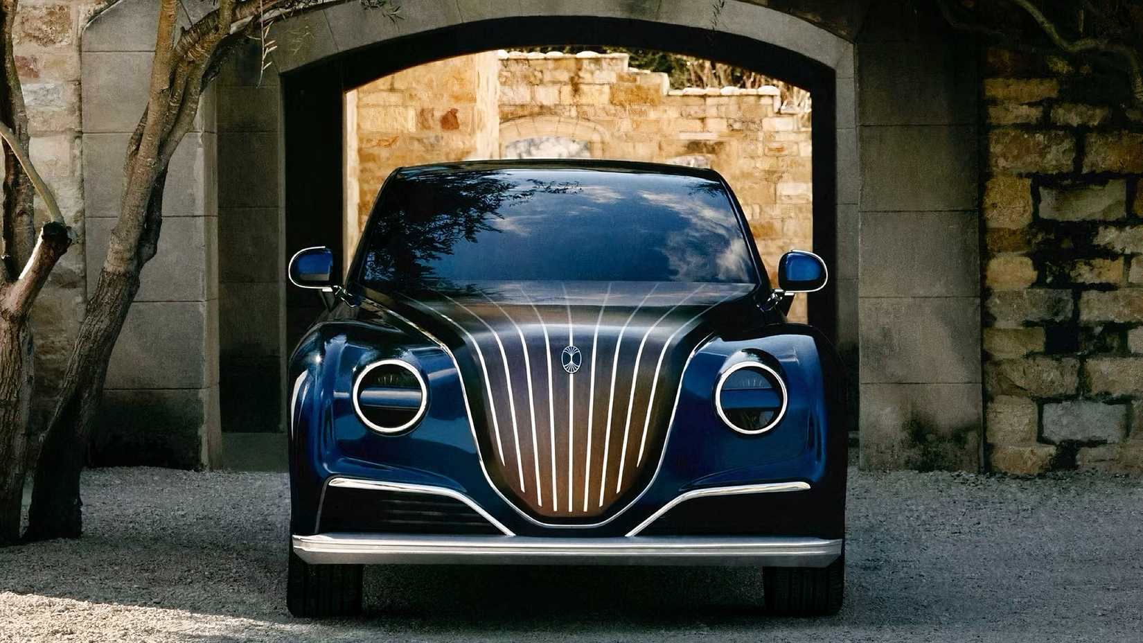 Front shot of Dacora luxury car in black parked under arch