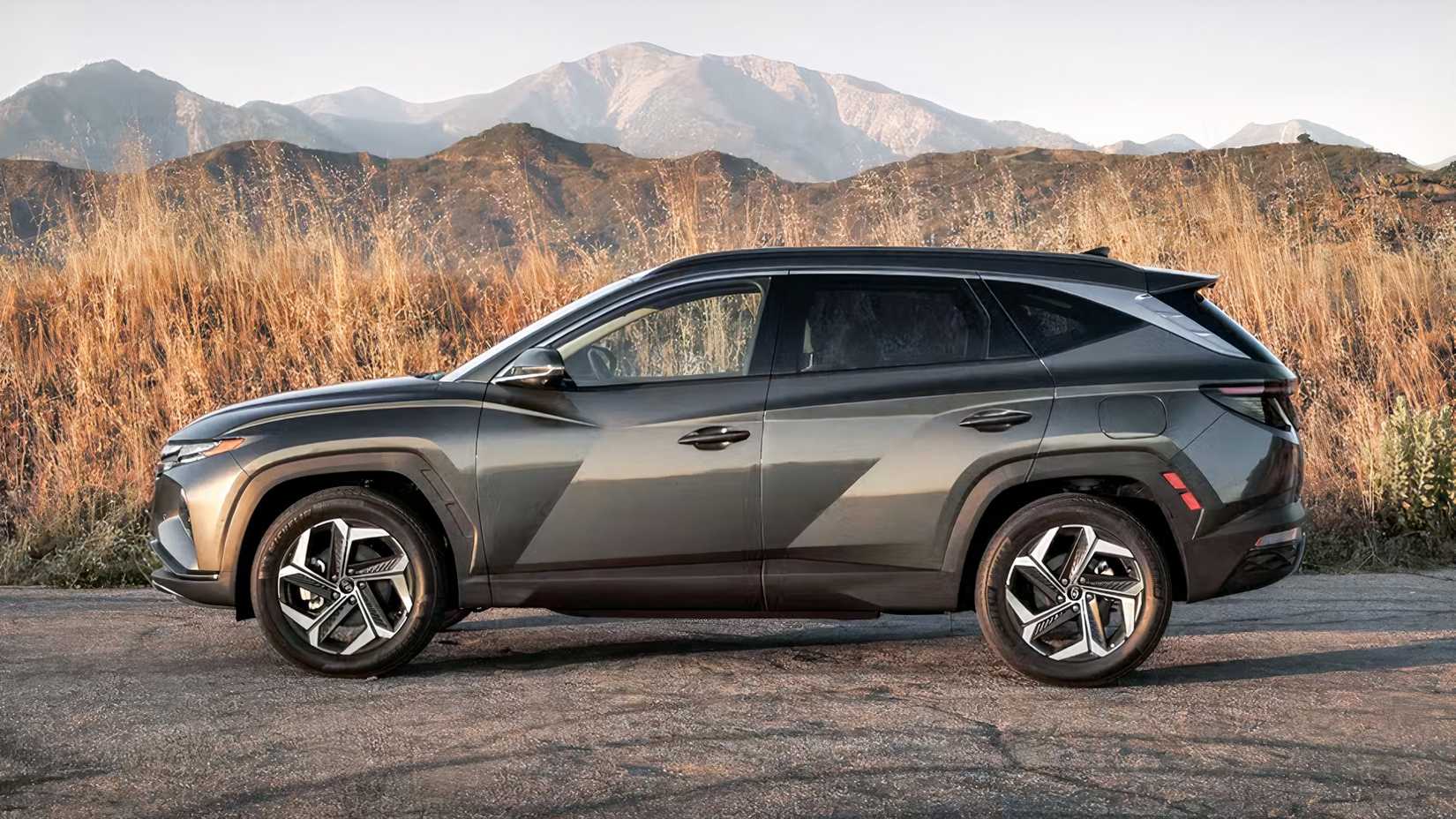 Profile shot of 2023 Hyundai Tucson Hybrid parked off-road