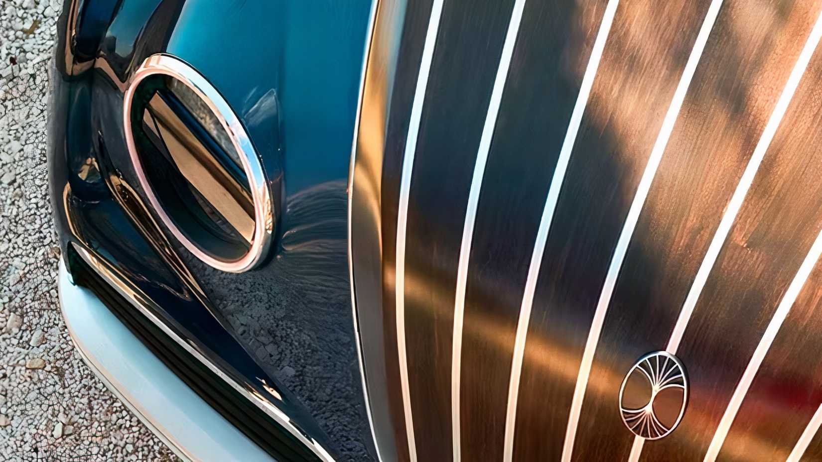 Close-up shot of Dacora luxury car front end and grille