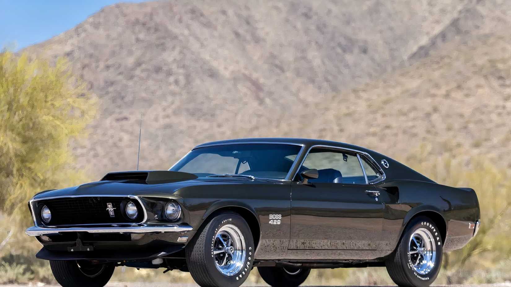 Front 3/4 shot of 1969 Ford Mustang Boss 429 parked